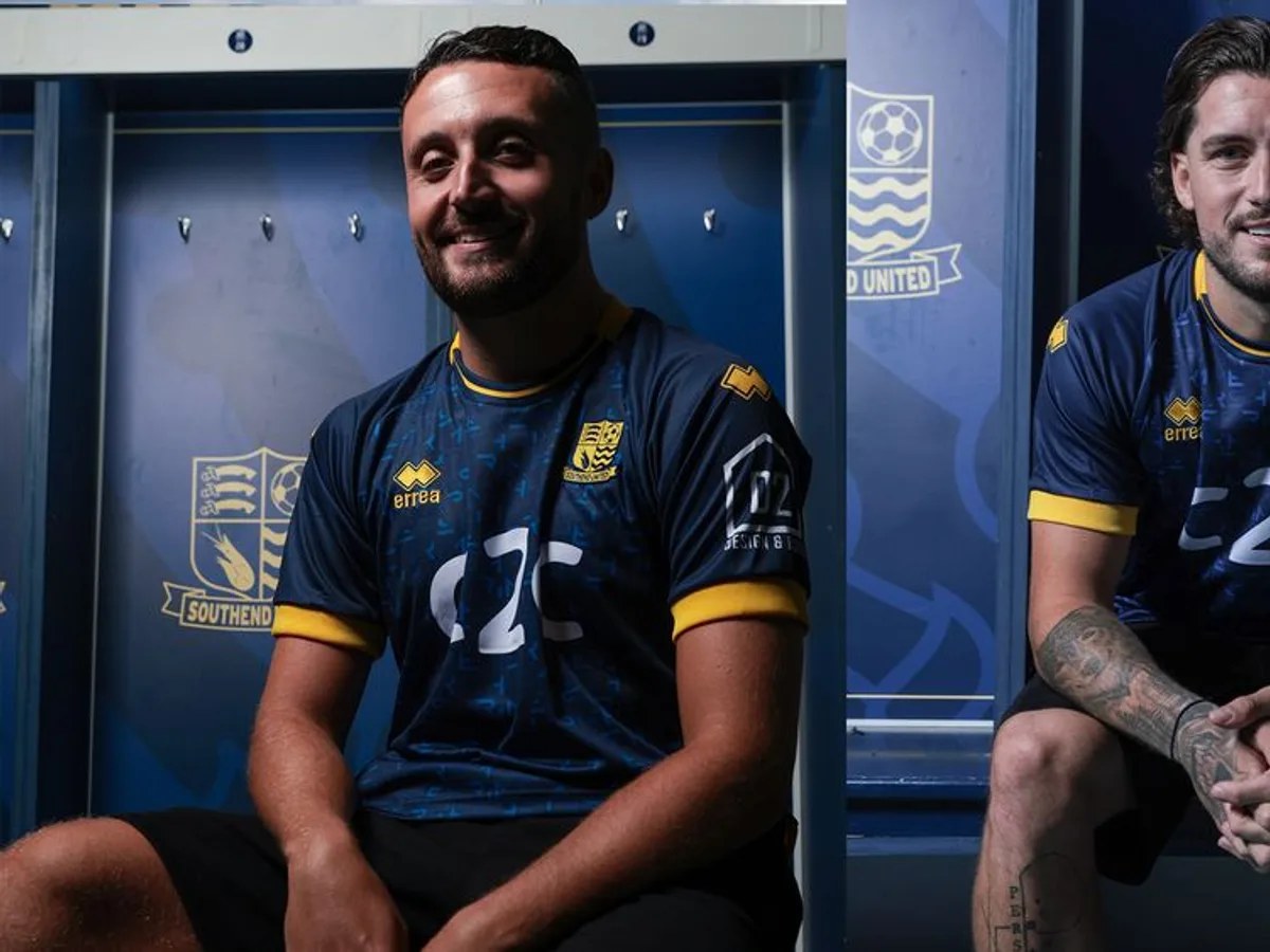 Darren Oldaker and Anthony Hartigan seated in the Southend United dressing room.